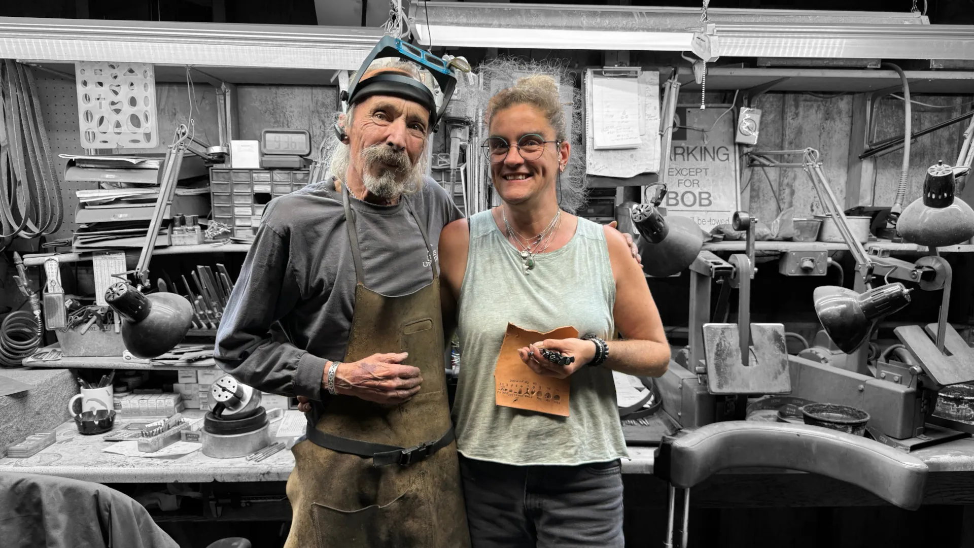 Robert Beard and Daniëlle Roossien posing together inside their workshop.